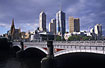 Brige over Yarra river with skyscrapers
