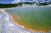 "Champagne pool": Boiling, green water and red minerals