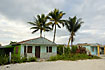Cuban houses on the beach with palms