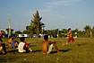 Cuban boys playing baseball in evening light