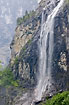 Wild nature in western Norway - waterfall plunges down cliff side