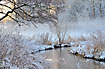 River in snow and fog