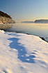 Shadows in the snow and fog over the Lilleblt waters