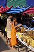 Breakfast for the buddhistic monks at Pha That Luang