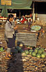 Woman eating watermelon at a morningmarket