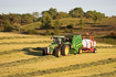 Modern hay harvesting and wrapping of grass