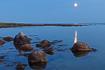 Coastal landscape on the small island Hirsholm in moonlight