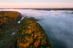 Misty autumn morning by af Danish Lake. Drone photo.