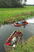 Boats for weed cutting in streams