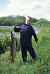 Kid with his first fish- 86cms of pike