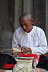 A buddhist monk telling people`s fortunes