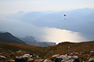 Paraglider with Lake Garda in the background