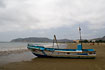 Fishing boat on the beach in Puerto Lopez.