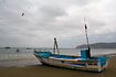 Fishing boat on the beach in Puerto Lopez.