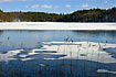 Snow formations on the ice covered lake